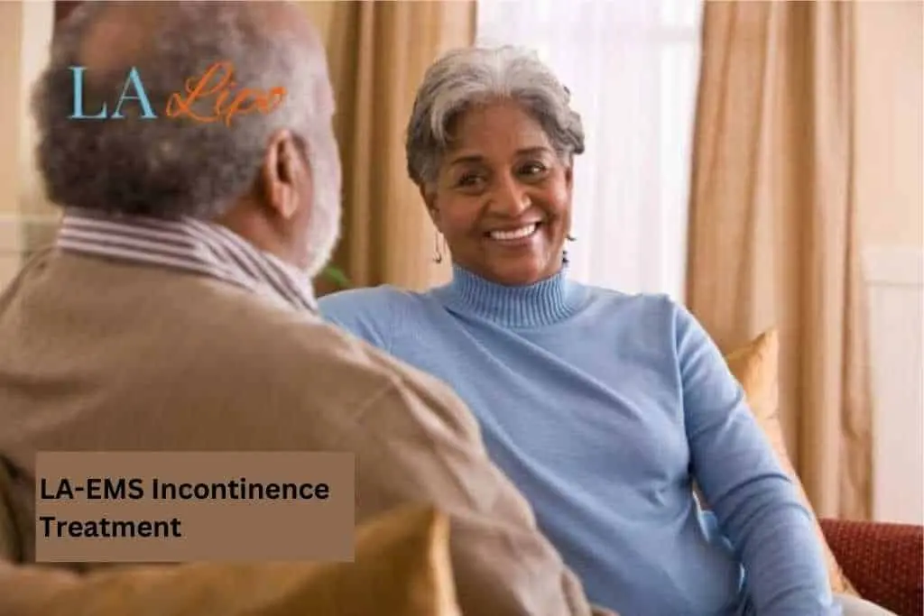Couple sat smiling at each other - LA-EMS treatment Notting Hill