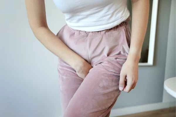 older woman running to the toilet because of urinary incontinence Notting Hill